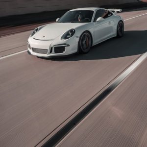 white porsche 911 on road
